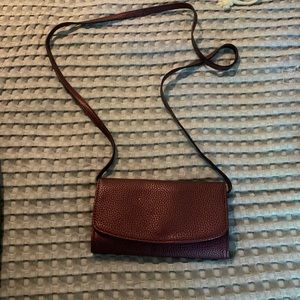 Small cross body purse, can fit phone, cards.